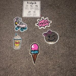 Iron on patches that include a bag/instructions